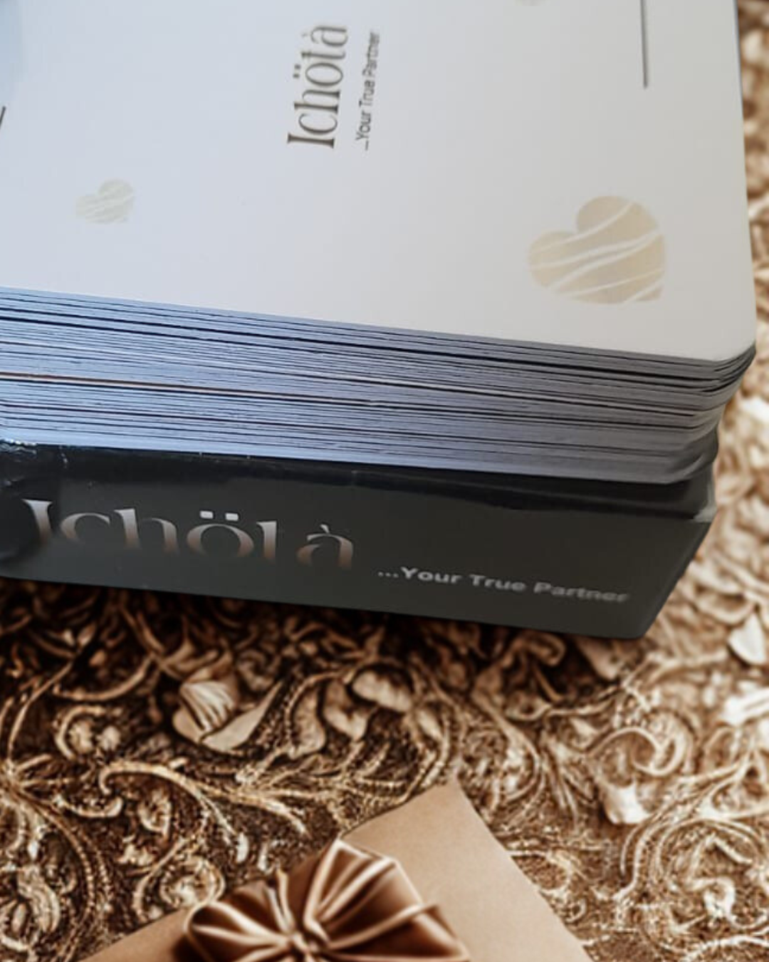 The deck seen edge-on, resting on its black foiled slipcase